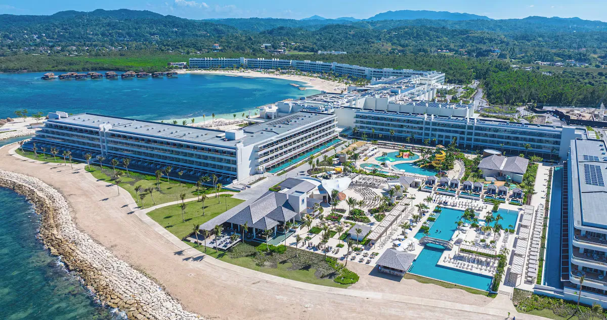 The north coast from the air, with the bay, the resort and the hills behind